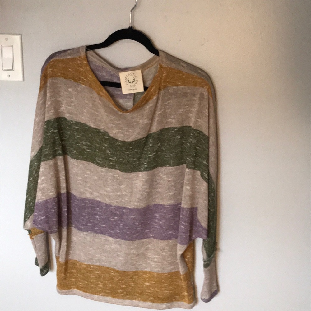 Knitted bat-wing blouse.